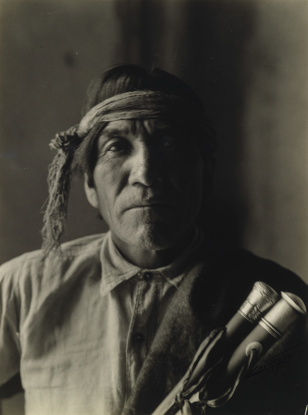 EDWARD S. CURTIS (1868-1952) A group of 12 signed silver prints, including some published in The North American Indian.